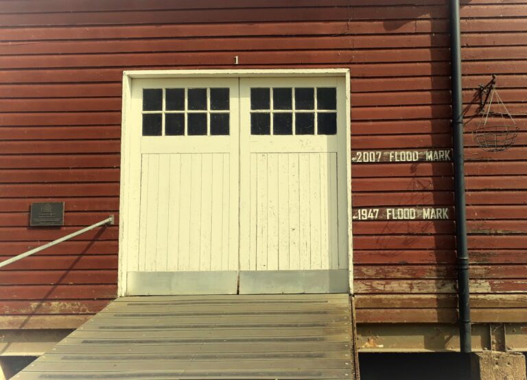 Building doors with two flood levels marked