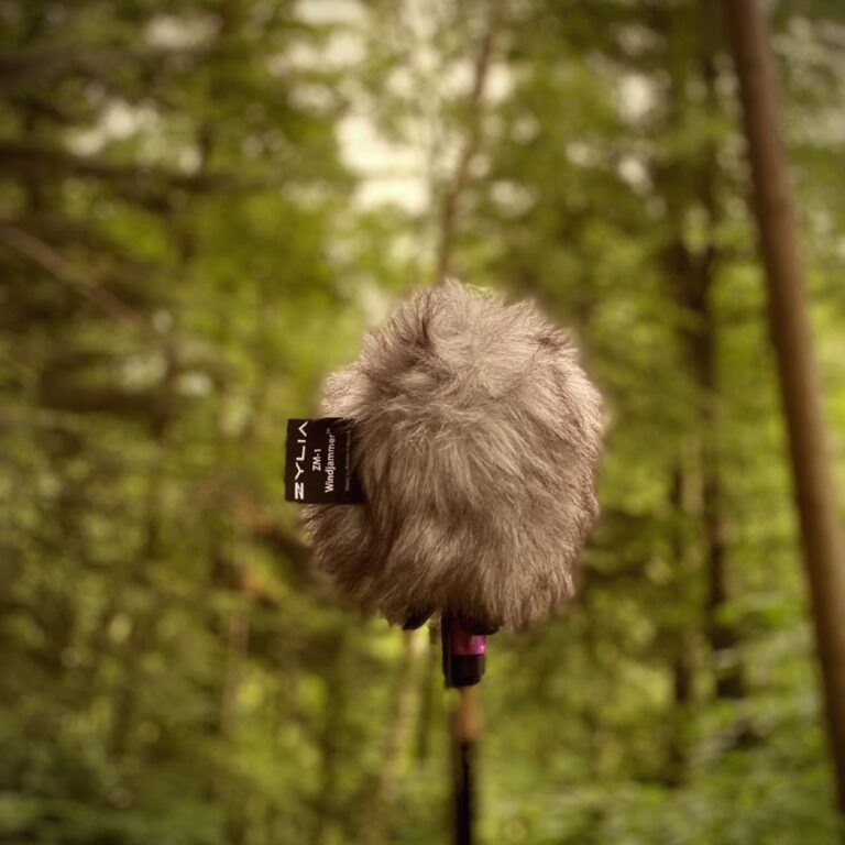 A microphone in front of trees